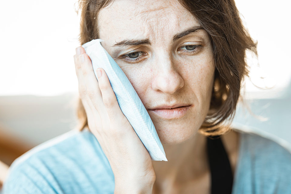 woman with jaw pain