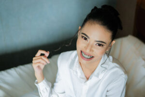 smiling woman with braces