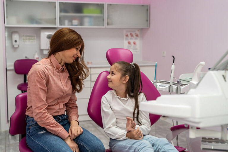 mom and child in orthodontist office
