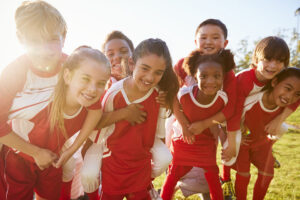 kids playing sports with braces